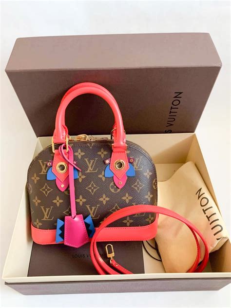 louis vuitton flamingo|louis vuitton alma bb strap.